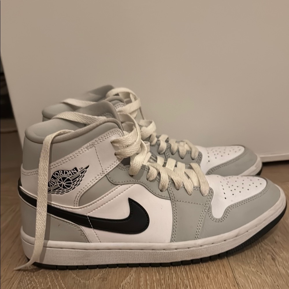 Nike Air Jordan Gray and White High-Tops